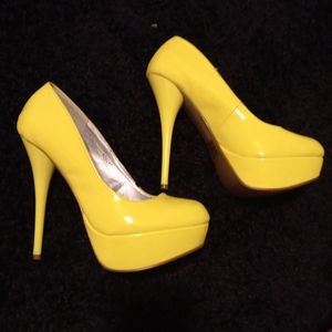 Neon yellow high heels